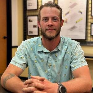 Portrait of Dawson Hopkins for Puetz Design + Build in South Dakota.